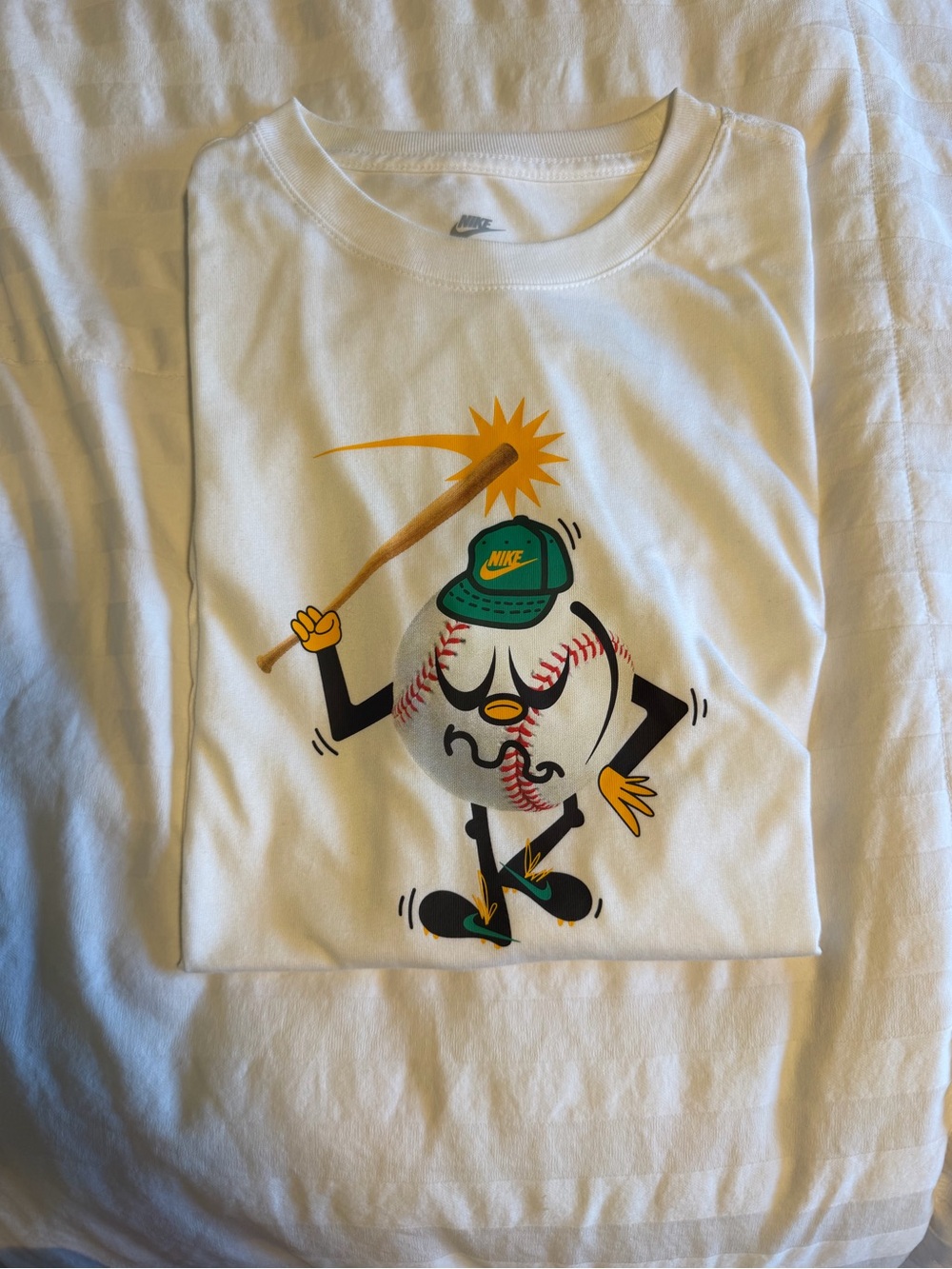 Nike White Long Sleeve Tee with Colorful Baseball Character Graphic